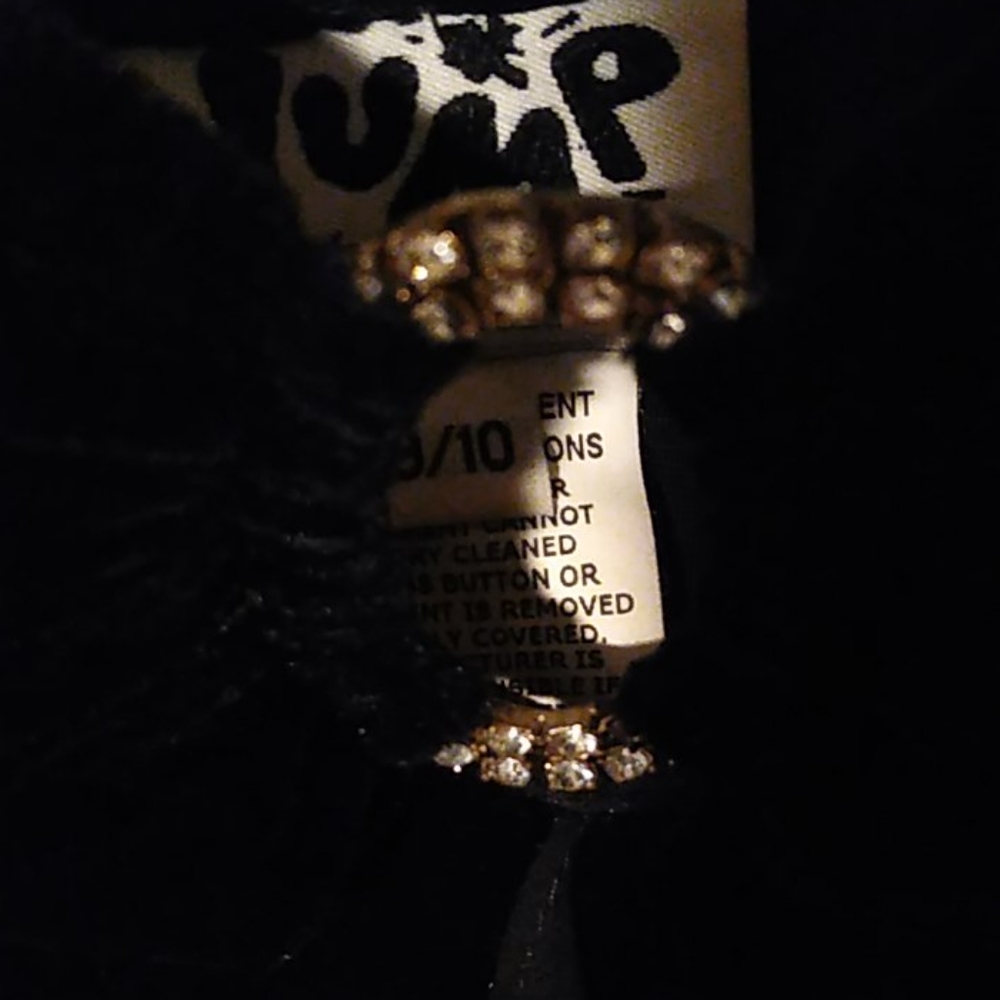 Evening gown with oval rhinestone in the middle of